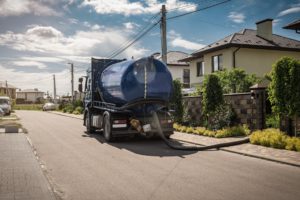 Sewage Tank truck. Sewer pumping machine. Blue Septic truck